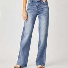 Risen Mid Rise Wide Leg Jeans - The Perfect Pair Medium Wash Straight Fit Wide Leg Bottoms, Non-stretch Straight Leg Medium Wash Jeans, Non-stretch Straight Leg Jeans In Medium Wash, Fall Medium Wash Mid-rise Wide Leg Pants, Medium Wash Mid-rise Wide Leg Pants For Fall, Mid-rise Straight Fit Flare Jeans With Pockets, Mid-rise Medium Wash Wide Leg Pants For Fall, Light Wash Wide Leg Bottoms With Straight Fit, Medium Wash Wide Leg Straight Fit Jeans