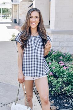 Enjoy the sun in this easy and lightweight gingham top in charcoal. We love this top paired with white denim shorts for a cute and casual look. Gingham top in charcoal Short sleeves Loose fit Runs true to size Piper is 5'3, wears a size 2 and is wearing a Small! Chic Plaid Tops For Day Out, Chic Plaid Summer Tops, Chic Short Sleeve Tops For Picnic, Casual Plaid Blouse For Picnic, Chic Gingham Blouse For Summer, Chic Spring Picnic Tops, Plaid Short Sleeve Top For Summer, Trendy Summer Tops For Picnic, Plaid Tops For Everyday Summer Wear