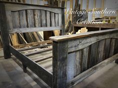 an old wooden bed frame with the words vintage southern creations written on it in large letters