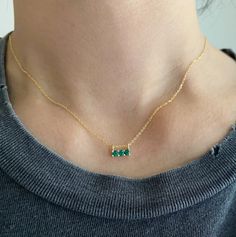 A braided-front ring that brings a textural element to your stacking options. It's a simple stunner that adds something unexpected to your ring game. Elegant 14k Gold Emerald Necklace With Delicate Chain, Elegant Green Birthstone Necklace With Delicate Chain, Minimalist Emerald Necklace In Yellow Gold, Minimalist Emerald Necklace With Delicate Chain, Dainty Emerald Necklace With Delicate Chain For Everyday, Minimalist Green Emerald Necklace With Delicate Chain, Dainty Emerald Necklace With Delicate Chain, Emerald Necklace With Delicate Chain For May Birthstone, Yellow Gold Emerald Clavicle Necklace For May Birthstone