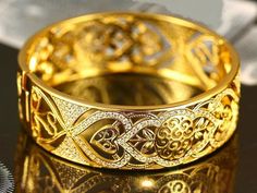 Dubai gold collection bangle with beautiful white zircons Dubai Gold Bangles, Gold Jewellery India, Dubai Design, Dubai Gold Jewelry, Gold Bangle Set, Gold Jewellry, Bridal Fashion Jewelry, Gold Jewelry Sets, Gold Plated Bangles