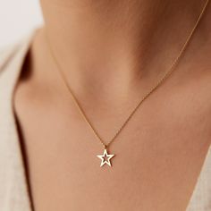 The delicate gold chain holds a beautifully crafted star charm, symbolizing hope and good fortune. Measuring approximately 10 x 10 mm in size, this necklace is the perfect size for everyday wear. Whether you're looking for a special gift for a loved one or simply treating yourself to a beautiful piece of jewelry, this lucky star charm necklace is a timeless and meaningful choice. ▶ Features * Made to Order. * Gold KT: 14K * Custom Gold Color: Rose Gold, Yellow Gold, White Gold * Charm 10mm x 10mm * Ready to Ship in 3-5 Business Days ▶ See more of our Gold Necklaces here- http://etsy.me/2lUxj86 ▶ See our storefront here - http://etsy.me/2lUcVnH  ▶ All store sections here * Diamond Rings - http://etsy.me/2lwKUl8 * Diamond Earrings - http://etsy.me/2lyqVBP * Diamond Necklace - http://etsy.me/ Gold Star Jewelry, Star Necklaces, Gold Star Pendant, Jewelry Necklace Simple, Mens Hairstyles Curly, Interlocking Circle Necklace, Delicate Gold Chain, Star Necklace Gold, Star Charm Necklace