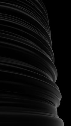 an abstract black and white photo with wavy lines