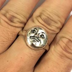 Introducing Moon Face Ring. Both Men and Women can wear. Base Material: Sterling Silver  Depth: 14mm (app) Metal Stamp: 925 Packaging: Own Personalized Gift Box  SPECIAL ANNOUNCEMENT  1. Please visit https://www.etsy.com/shop/yhtanaff for more designs. 2. Subscribe to our newsletter to receive a Coupon Code for a 10% discount.      "At Our Shop Profile's Announcement Section" 3. Please LIKE our Facebook Fan Page: URL:  https://www.facebook.com/HandmadeSilverJewelryByYhtanAff Sterling Silver Friendship Ring, Friendship Sterling Silver Ring, Adjustable Silver Novelty Ring, Unique Adjustable Sun And Moon Design Rings, Handmade Adjustable Novelty Rings, Adjustable Ring With Sun And Moon Design, Unique Adjustable Moon Shaped Ring, Adjustable Moon Shape Unique Ring, Unique Adjustable Moon-shaped Ring