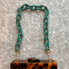 Acrylic Purse Strap in Turquoise Trendy Box Bag With Detachable Strap As Gift, Green Rectangular Box Bag With Adjustable Strap, Rectangular Box Bag With Adjustable Strap For Gift, Green Shoulder Bag With Chain Strap As Gift, Rectangular Box Bag With Adjustable Strap, Rectangular Box Bag With Adjustable Strap As Gift, Trendy Rectangular Turquoise Shoulder Bag, Trendy Turquoise Rectangular Shoulder Bag, Green Adjustable Rectangular Bag Strap