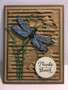 a card with a dragonfly on it