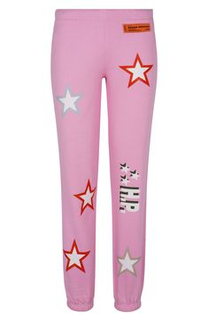 Bold stars cover these cozy all-cotton sweatpants cast in a fun bubblegum pink shade. Elastic waist 100% cotton Machine wash, dry flat Made in Portugal Designer Clothing Black Owned/Founded Pink Cotton Sporty Sweatpants, Pink Cotton Sweatpants, Trendy Pink Relaxed Fit Sweatpants, Pink Cotton Joggers With Relaxed Fit, Pink Relaxed Fit Cotton Sweatpants, Pink Relaxed Fit Cotton Joggers, Pink Cotton Relaxed Fit Joggers, Pink Cotton Relaxed Fit Sweatpants, Trendy Pink Relaxed Fit Joggers