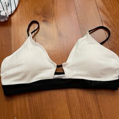 Never Worn Black And White Cupshe Bikini Top. Excellent Condition. Trendy White Seamless Swimwear, Trendy White Triangle Top Swimwear, Trendy White Lined Swimwear, Chic White Lined Swimwear, Chic White Swimwear With Built-in Bra, Summer Black Partially Lined Swimwear, White Lined Summer Swimwear, Partially Lined Black Swimwear For Beach, Black Partially Lined Swimwear For The Beach