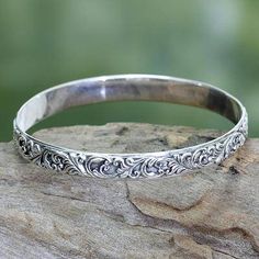 Sterling silver bangle bracelet, 'Timeless Bali' - Artisan Jewelry Sterling Silver Bangle Bracelet 925 Silver Bracelet Novica, Luxury Ornate Sterling Silver Bracelets, Ornate Luxury Sterling Silver Bracelet, Luxury Hand-strung Sterling Silver Jewelry, Luxury Traditional Etched Sterling Silver Bracelet, Luxury Silver Ornate Bracelets, Luxury Victorian Sterling Silver Bracelet For Formal Occasions, Luxury Hand Forged Sterling Silver Bangle Bracelet, Bohemian Luxury Sterling Silver Bracelet For Wedding