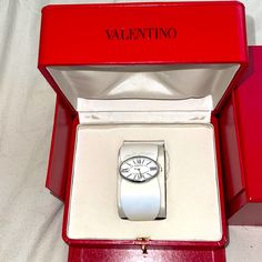 Brand New , White Leather Valentino Watch With Its Box, And Certificate Timeless White Watches For Evening, Elegant Leather Strap Watch As A Gift, Classic White Evening Watch, Designer White Leather Watches, Elegant Watches With Palladium Hardware As A Gift, Designer Watches With Leather Strap As Gift, Luxury White Leather Jewelry, Classic White Watches With Original Box, Silver Leather Watch For Evening