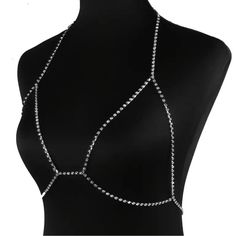 Eye-Catching Design: Unique And Bold Chest Chain Adds A Touch Of Personality To Any Outfit Sexy And Exaggerated: Perfect For Adding A Daring And Seductive Touch To Your Look Versatile: Can Be Worn With A Variety Of Outfits, From A Simple Tank Top To A Plunging Neckline Dress Trendy Party Body Jewelry With Chain Strap, Trendy Silver Body Chain For Party, Silver Trendy Body Chain For Party, Silver Body Chain For Night Out In Summer, Summer Party Jewelry With Silver Chain, Summer Party Silver Chain Jewelry, Elegant Metal Body Chain For Night Out, Silver Body Chain For Summer Night Out, Trendy Adjustable Party Body Chain