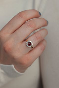 Round Ruby Ring Design, 2026 Graduation, Flowers As A Gift, Receive Flowers, Round Garnet Ring, Indian Wedding Rings, Ruby Ring Designs, Garnet Wedding Rings, Ring With Halo