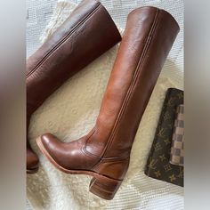 Circa 1970’s-1980’s This Pair Of Frye Vintage Campus Boots Are In Excellent Condition And Appear To Have Only Been Worn Once. Rare Pull On Collectors Banana Lining Women’s Size 5 Approximate Measurements: 2” Heel 14.5” Shaft Circumference 15.5” Shaft From Arch Scope Our Shop For More Boots. Vintage Calf Leather Boots With Leather Sole, Vintage Vegetable-tanned Leather Boots, Classic Vintage Brown Boots, Vintage Goodyear Welted Boots With Almond Toe, Vintage Leather Boots With Rubber Heel Cap, Vintage Calf Leather Boots With Snip Toe, Fitted Vintage Boots With Goodyear Welted, Fitted Vintage Boots With Goodyear Welt, Vintage Goodyear Welted Boots For Fall