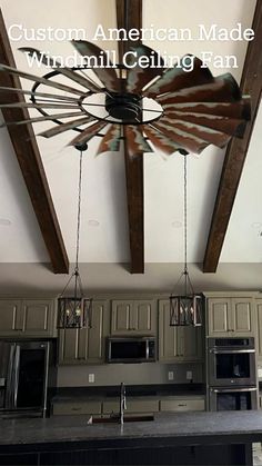 the ceiling fan in this kitchen is made from wood beams and has metal blades hanging from it