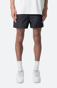 Sunny-day adventures are easy in these hardy ripstop shorts punctuated by a contrast orange drawcord handy pockets. 3" inseam; 14" leg opening; 14" front rise Elastic/drawcord-toggle waist Side-seam pockets 100% polyester Machine wash, line dry Imported Black Shorts With Functional Drawstring For Streetwear, Black Nylon Hiking Shorts, Black Swim Trunks With Pockets For Outdoor Activities, Black Athletic Shorts For Summer Outdoor Activities, Black Relaxed Fit Nylon Shorts, Black Nylon Shorts With Relaxed Fit, Black Outdoor Shorts With Elastic Waistband, Black Shorts With Elastic Waistband For Outdoor, Black Nylon Swim Trunks For Outdoor Activities