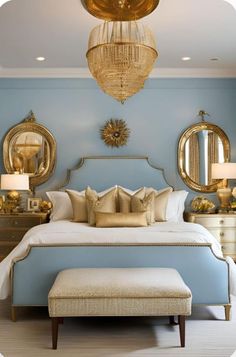 a bedroom with blue walls and gold accents