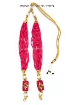 Magenta color layered seed Beads Dori - Tassel for Pendants 
  Length of the beads dori : 16.0 inches + adjustable upto 24 inches
  This item is NOT made of Gold
  This item does NOT have any Gold in it
  Use this dori - Tassel to attach it to pendants
  The dori - Tassels come with detachable hooks on each side, so it is very easy to clip it on to any pendant. 
  Add this to your favorite pendant to enhance its beauty. These will look awesome with our Temple Jewelry Pendants. 
  Buy these in va Traditional Multi-strand Beaded Necklaces For Celebration, Traditional Pink Jewelry With Tiny Beads, Traditional Pink Beaded Necklaces With Dangling Beads, Traditional Pink Adjustable Beaded Necklaces, Traditional Pink Beaded Necklace With Dangling Beads, Festive Multicolor Beaded Necklaces With Dangling Beads, Traditional Adjustable Pink Beaded Necklace, Traditional Pink Beaded Necklaces, Festive Multicolor Beaded Necklace With Dangling Beads