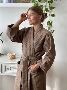 "Waffle Hand Made Kimono style Bathrobe Wrap yourself into the most comfortable robe ever. Breathable, high-quality, cosy, and sustainable. Perfect as a gift for any occasion. Made from 100% pure organic Netherlandish cotton. Oeko-Tex Standard 100 Certified ® Enjoy the spa feeling at home! * Soft and comfortable * Absorbent and quick drying * Lightweight and breathable * Durable * Hypoallergenic * 100% cotton waffle  * Easy garment care SIZING Bathrobes are designed for a loose fit: S/M:  - total length (center back length) - 115 cm/45\"; - bust - 60 cm/23.6\"; L/XL:  - total length (center back length) - 115 cm/45\"; - bust - 66 cm/26\"; Models wearing size S/M Girl height 5'61 /168cm C O L O R S: We have a wide selection of colors: https://www.etsy.com/shop/KajStore?ref=seller-platform-m Robe For Women, Women Robe, Mode Kimono, Women's Robe, The Spa, Chocolate Color, Kimono Style, Womens Robes, Taupe Color