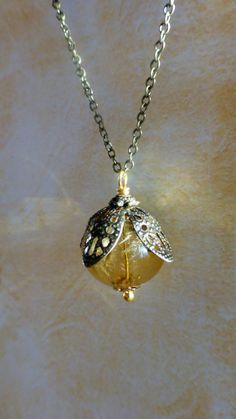 Dandelion  necklace  Amber color  glass orb by DancingEyeJewels, $22.50 Floral Terrarium, Dandelion Necklace, Glass Orb, Terrarium Jewelry, Jewelry Nature, Dandelion Seed, Chain Top, Flower Tops, Amber Color