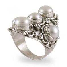 Neeru Goel casts a spell of regal elegance with the design of this full finger ring. It is crafted by hand with sterling silver featuring classic Indian ornamentation. Five pearls crown the design with iridescent majesty. Pearls represent June??s birthstsones. .925 Sterling silver Luxury Exquisite Silver Pearl Ring, Elegant Sterling Silver Cabochon Pearl Ring, Elegant Cabochon Moonstone Open Ring, Silver Pearl Ring Fine Jewelry, Classic Silver Cabochon Pearl Ring, Elegant Sterling Silver Hallmarked Moonstone Ring, Elegant Sterling Silver Moonstone Ring (hallmarked), Elegant Hallmarked Moonstone Sterling Silver Ring, Elegant Hallmarked Moonstone Ring In Sterling Silver