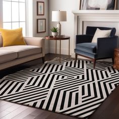 a living room with two couches and a rug on the floor in front of a fireplace