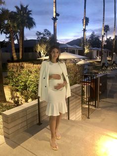 Introducing the Claire - a simple yet stylish and complementing dress to be worn throughout all stages of pregnancy. It’s figure-flattering and perfect for a warmer weather occasion or night out. We love the sassy fit and flare style that falls slightly below the knees. As worn on air by Megan Telles, news anchor for KTLA-5 (last 3 photos)! Color: White/Off-White Below knee length Body-con fit with flare bottom Fabric: 100% Stretch Milk Fiber Care: Gentle wash cold with like colors / do not blea