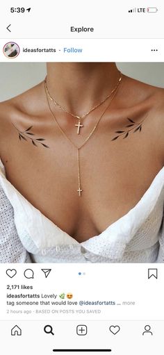 the back of a woman's chest with arrows on it and an arrow tattoo