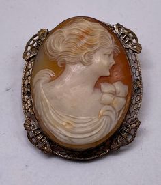 "Beautiful Antique Art Nouveau Silver Filigree Cameo Hand Carved Large Brooch Pin Very Good Pre/owned Condition Measures 1 3/4\" X 1 1/2\" width." Carved Oval Brooch For Formal Wear, Carved Oval Brooch For Formal Occasions, Carved Oval Brooches For Formal Wear, Antique Cabochon Brooch For Formal Occasions, Ornate Cabochon Brooch For Formal Occasions, Ornate Cabochon Brooches For Formal Occasions, Antique Cabochon Brooch For Formal Wear, Carved Brooches For Formal Occasions, Antique Cabochon Brooch For Wedding