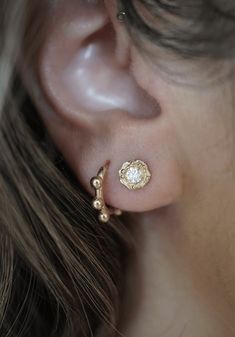 Part of our Water Collection, these Diamond stud earrings are the perfect everyday piece. Enough sparkle to be worn in the first hole piercing or stacked with one of your favorites. Shown paired with our Gold Ball Huggies and large Winslet Studs as shown in third image. Sold as a pair. Pairs nicely with The Mini Winslet Ring 14k yellow gold TDW .25ct This BaYou with Love jewelry piece is crafted by hand in our Downtown Los Angeles studio using recycled gold, including recovered gold from technol Gold Moon Earrings Studs, Nikki Reed, Water Collection, Recycled Gold, Diamond Earrings Studs, Diamond Studs, Jewelry Pieces, Diamond Earrings, Sparkle