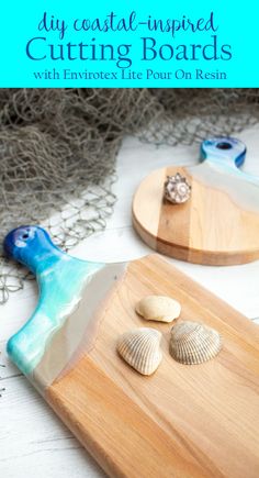 two wooden cutting boards with seashells on them and the words diy coastal inspired cutting boards