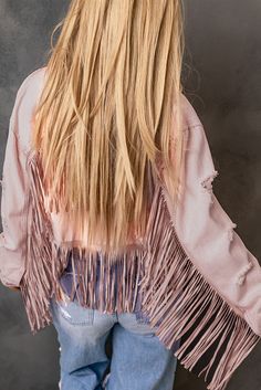 Pink Distressed Fringed Cropped Denim Jacket Trendy Cotton Denim Jacket With Fringe, Spring Cotton Denim Jacket With Fringe, Spring Denim Jacket With Fringe In Cotton, Trendy Fringed Cotton Denim Jacket, Spring Denim Jacket With Fringe, Trendy Fringed Denim Jacket For Spring, Trendy Fringe Denim Jacket For Spring, Trendy Fringe Outerwear For Spring, Trendy Spring Fringe Outerwear