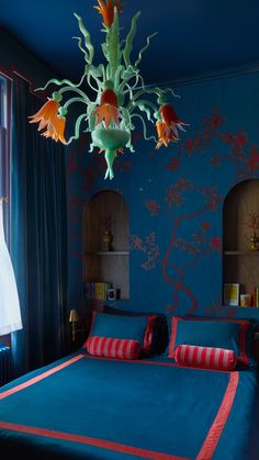 The fashion designer's London apartment is a “Wes Anderson–meets–Oscar Wilde fantasyland.” Photo by Miguel Flores-Vianna, Styled by Joan Hecktermann Harris Reed, Antique Mirror Wall, London Flat, London Apartment, Murano Glass Chandelier, Marble Floor, Painted Floors, Reception Rooms, Architectural Digest