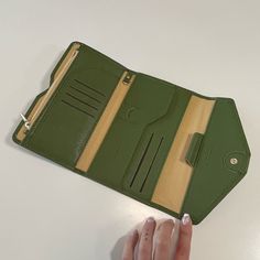 Travel Wallet - Olive Green - Brand New - 5 X 7.5 Travel Wallet Perfect To Take On Vacation With You To Keep All Of Your Documents Organized. Plenty Of Compartments, Inserts For Cards And Ids And Zippered Pouch. Has A Pen Holder, Perfect For Filling Out Last Min Paperwork. Also Has A Little Attachment That Allows You To Hook It Onto Another Bag/Purse To Make Sure It's Always Save. Never Used. Nwot. Bifold Coin Purse With Magnetic Closure For Travel, Versatile Travel Wallet With Snap Closure, Green Rfid Blocking Coin Purse For Travel, Green Travel Wallet Pouch, Travel Wallet Clutch With Snap Closure, Green Coin Purse With Card Slots For Travel, Green Trifold Wallet For Daily Use, Everyday Green Wallets With Interior Card Slots, Green Rfid Blocking Trifold Wallet For Travel