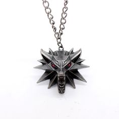 Embark on a journey through The Witcher universe with the Wolf Pendant Necklace, a tribute to the legendary adventures of Geralt in The Witcher 3: Wild Hunt. Crafted with precision and passion, this metal neck chain features the iconic wolf head pendant, symbolizing courage, resilience, and the spirit of the wild. With its finely detailed design and two captivating variations—red eyes and black eyes—this necklace captures the essence of The Witcher world, adding a touch of mystique and intrigue Witcher Medallion, Geralt And Ciri, Wolf Pendant Necklace, Witcher 3 Wild Hunt, Wolf Necklace, Wolves Pendants, Dainty Diamond Necklace, Witcher 3, Wild Hunt