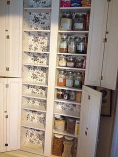 an open pantry with lots of food in it