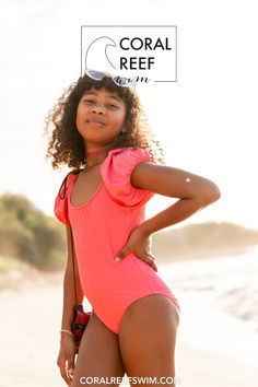 Meet the Mini Pura Vida One Piece in Coral Crush! This delightful one-piece swimsuit is perfect for young girls who love to make a splash. Featuring adorable short puff sleeves, this swimsuit offers a stylish and charming look. Designed for full coverage and fully lined for ultimate comfort, the Mini Pura Vida One Piece ensures your little one can swim and play with ease and confidence. Ideal for pool parties, beach days, and all summer adventures! Pool Parties, Summer Adventures, Pool Party, Dark Pink, One Piece Swimsuit