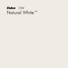 a white wall with the words dulux 15w natural white on it