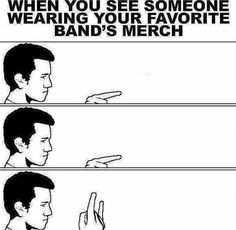 a man pointing at something with the caption when you see someone wearing your favorite band's merch