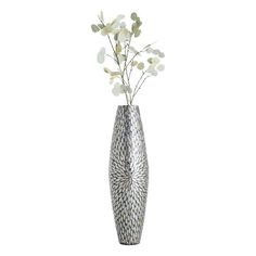 a silver vase with some white flowers in it