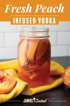 fresh peach infused vodka in a mason jar with sliced peaches on the side and text overlay that reads, fresh peach infused vodka