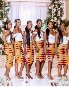 a group of women standing next to each other