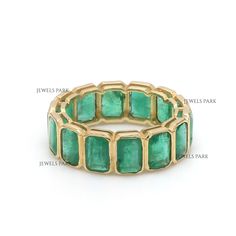 Antique emerald bezel set eternity band gold, Natural 6X4MM 7CTW emerald cut emerald eternity ring gold, Vintage art deco emerald ring gold STONE DETAILS : ✦ Gemstone : Emerald ✦ Gemstone Type : Natural ✦ Gemstone Size : 6x4 MM ✦ Gemstone Shape : Emerald cut ✦ Number of gemstones : 17 ✦ Gemstone Weight : 7 Carats ✦ Gemstone Grade : AAA(Vivid Green) METAL DETAILS : ✦ Metal : 14K/18K Gold ✦ Metal Color : Yellow / White / Rose Gold ✦ Setting : Bezel Setting ✦ Ring Box : Yes SHIPPING DETAILS : ✦ Shi Stackable Emerald Cut Emerald Ring, Fine Jewelry Emerald Cut Emerald Eternity Band, Stackable Yellow Gold Emerald-cut Emerald Ring, Formal Stackable Emerald Cut Emerald Ring, Art Deco Emerald Cut Ring With Bezel Setting, Emerald Eternity Ring, Art Deco Emerald, Art Deco Emerald Ring, Eternity Ring Gold