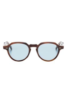 Havana brown acetate round frame blue tinted lenses UV-protective lenses sculpted arms with curved tips These glasses come with a protective case. Sculpted Arms, Round Frame Sunglasses, Frame Blue, Sunglasses Brown, Cutler And Gross, Havana Brown, Round Frame, Colored Sunglasses, Sunglass Frames