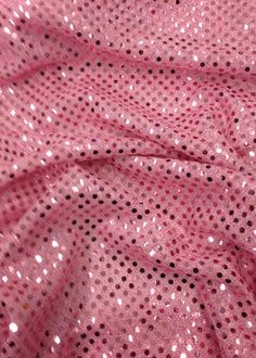 Pink sequins disco dots trans knit confetti 16 colors available sold per yard 44 inches wide. (sequined area is 36 inches wide, the margins are the base fabric). We have posted other listings for the rest of the 16 colors. Please look for them in our Etsy shop.  This fabric has shiny 3mm sequins evenly spaced all over the fabric. The sequins are the same color as the fabric. The sequins are reflective and create a beautiful shimmering effect with light. This fabric has a high quality mesh base. Pink Glitter Sequin Fabric For Summer, Summer Pink Sequin Fabric With Glitter, Summer Pink Glitter Sequin Fabric, Pink Disco Style Sequin Fabric, Pink Sequin Fabric For Disco, Pink Sequin Fabric For Disco In Summer, Pink Sequin Fabric For Disco Summer, Pink Sequin Fabric For Summer Disco, Pink Glitter Sequin Fabric For Festive Occasions