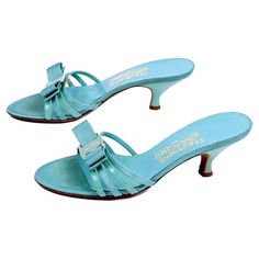 Salvatore Ferragamo Vintage Turquoise Blue Bow Sandals With Low Heels For Sale at 1stDibs Retro Formal Summer Sandals, Retro Formal Sandals For Summer, Light Blue Leather Sandals With Open Heel, Formal Light Blue Leather Sandals, Retro Almond Toe Sandals For Summer, Light Blue Leather Sandals For Formal Occasions, Retro Formal Sandals With Leather Sole, Vintage Formal Sandals With Removable Insole, Blue Almond Toe Sandals For Summer