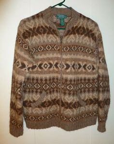 Up for bid is a Pre-Owned, gently used, Women's Lauren Ralph Lauren Exclusive Hand Knit Cardigan Sweater.  EXCELLENT CONDITION - no pulls, rips, stains, or holes.  The following are details of the sweater: Size Petite, PM - see measurements below 50% Llama & 50% Wool, made in China Full Zippered Front Closure Geometric Fair Isle pattern Brown & Beige colors 2 Front Pockets Chest measures approximately 19" (armpit to armpit - flat measurement) Length from top of shoulder to bottom of sweater meas Casual Wool Cardigan With Fair Isle Pattern, Brown Knit Cardigan With Fair Isle Pattern, Brown Fair Isle Knit Cardigan, Vintage Brown Sweater For Layering, Ivory Cardigan, Hand Knit Sweater, Sweater Patterns, Ralph Lauren Style, Zip Cardigan