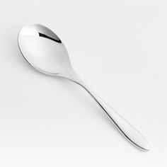 a close up of a spoon on a white surface