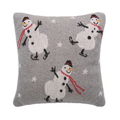 a grey pillow with snowmen on it