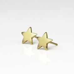 Minimalist gold star stud earrings, handmade of yellow 14k solid gold, with a highly shiny finish. These gold star studs are perfect for every occasion, great for any age. Chic and stylish, a wonderful gift for yourself or for someone you love. Star's hight is ~8.5 mm = ~0.33 inch Star's width is ~8.5 mm = ~0.33 inch 14k solid gold ear backs are included. * The earrings will be packed in a gift box ready to give as a gift, and shipped via Express mail service which usually takes 5-8 business day Modern Gold Star Earrings, Modern Gold Star-shaped Earrings, Minimalist Yellow Gold Star Earrings, Gold Star Earrings, Star Stud Earrings, Stud Earrings Gold, Solid Gold Earrings, Star Earrings Stud, Star Studs