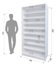 a man standing next to a tall white book shelf with measurements for the top and bottom shelves